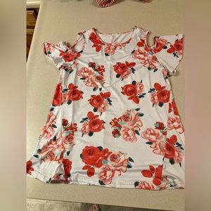 Cold shoulder white with pinkish orange flowers blouse. The size is large.